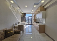 Dərnəgül metrosunun çıxışı, West Town yaşayış kompleksi